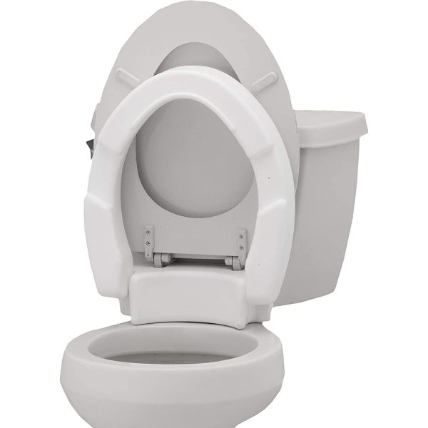 Nova Toilet Seat Riser Hinged. Image of the seat riser connected to a toilet.